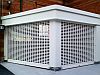Punched aluminium shopfront roller shutters with inlne pattern in white